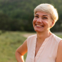 medium-shot-smiley-woman-outdoors